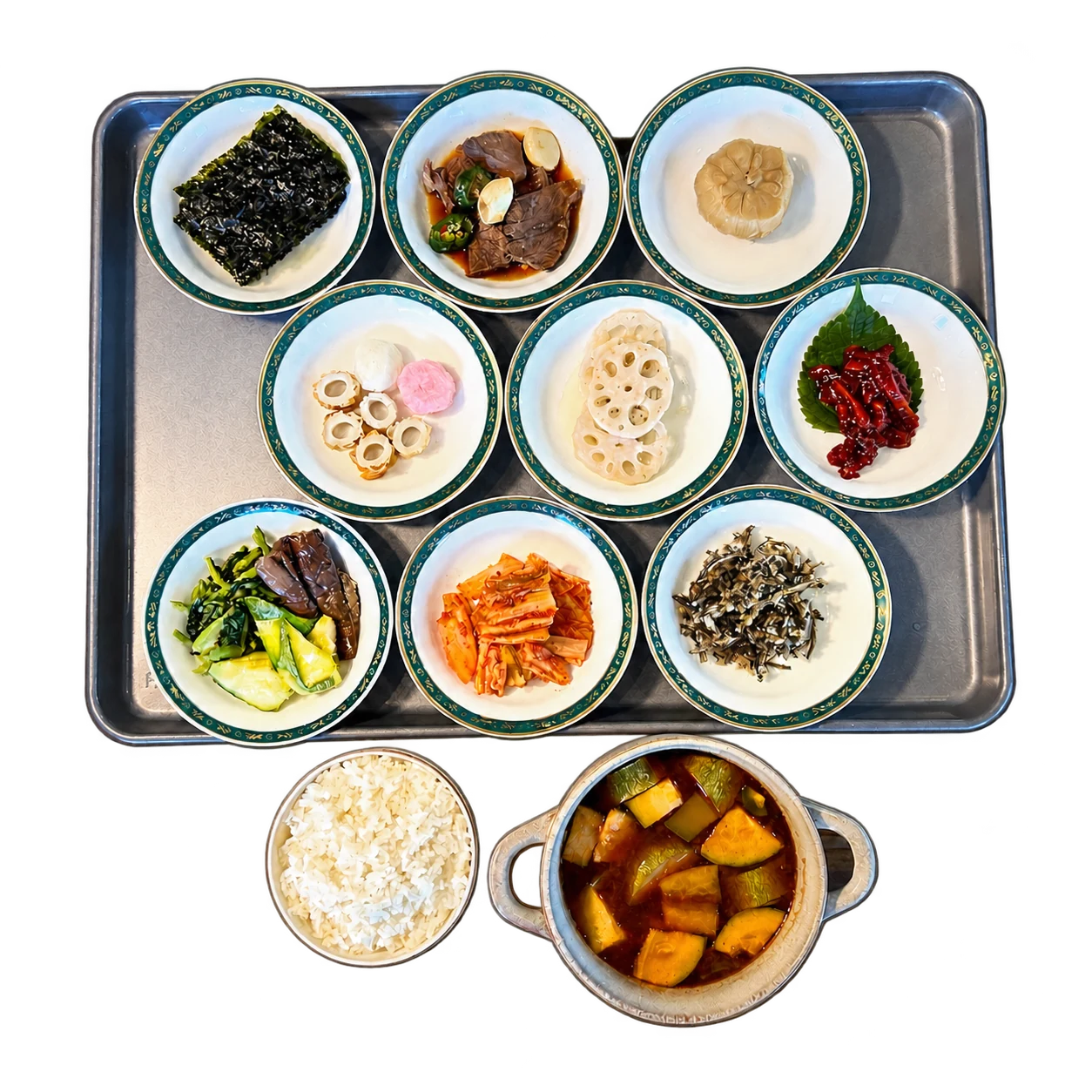 Korean Jungsik set with nine banchan dishes, rice, and doenjang soup